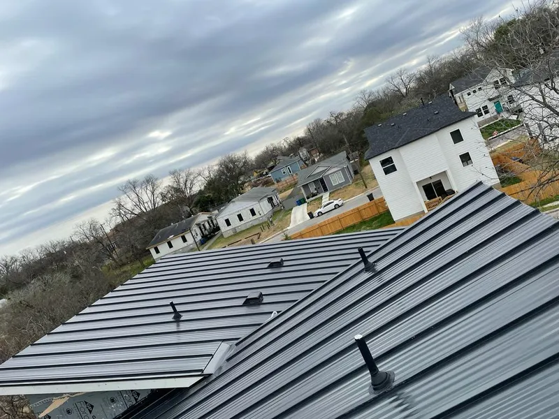 Standing seam metal roof panels with vents for Skylight Repair in Plainville